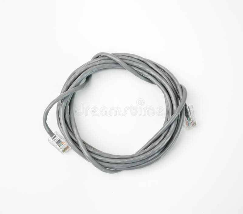 Patch cord network cable with molded RJ45 plug, isolated on a white background royalty free stock photos
