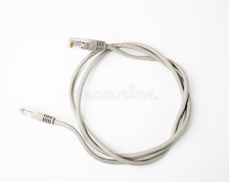 Patch cord network cable with molded RJ45 plug, isolated on a white background royalty free stock photography