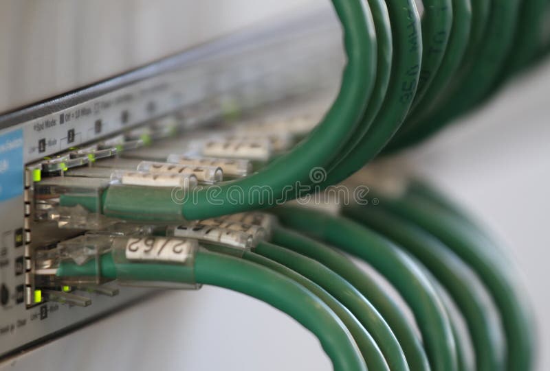 Patch panel cables for connecting to broadband internet stock images Patch panel cables for connecting to broadband internet stock images
