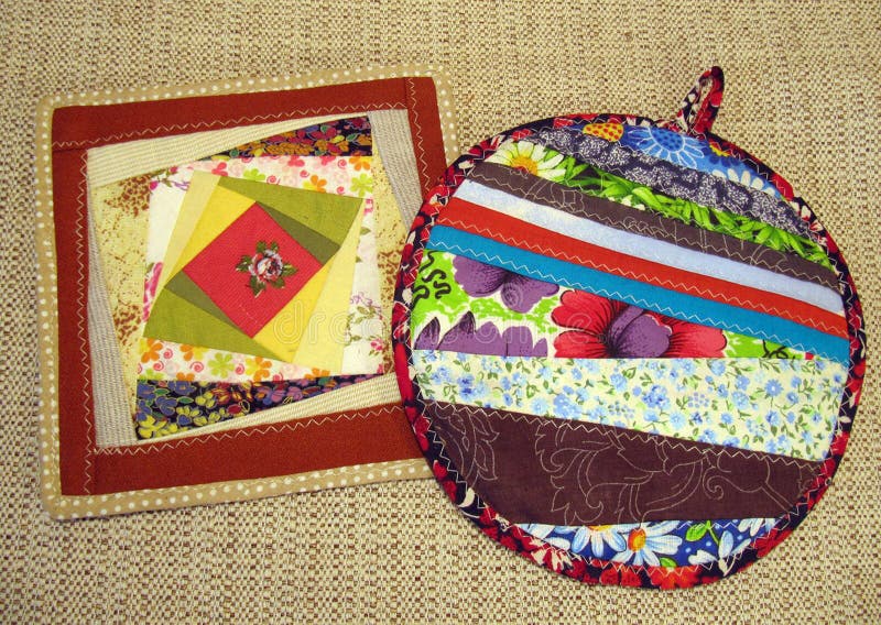 Patchwork of scraps and threads. Square and round napkin with decorative fabric patches .