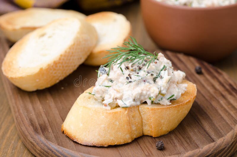 Pate of smoked fish with sour cream and dill on toasted bread