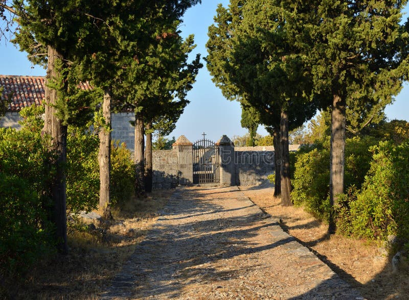 Path and a church gate