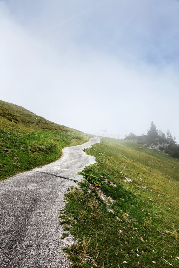 Path road up hill into mountain