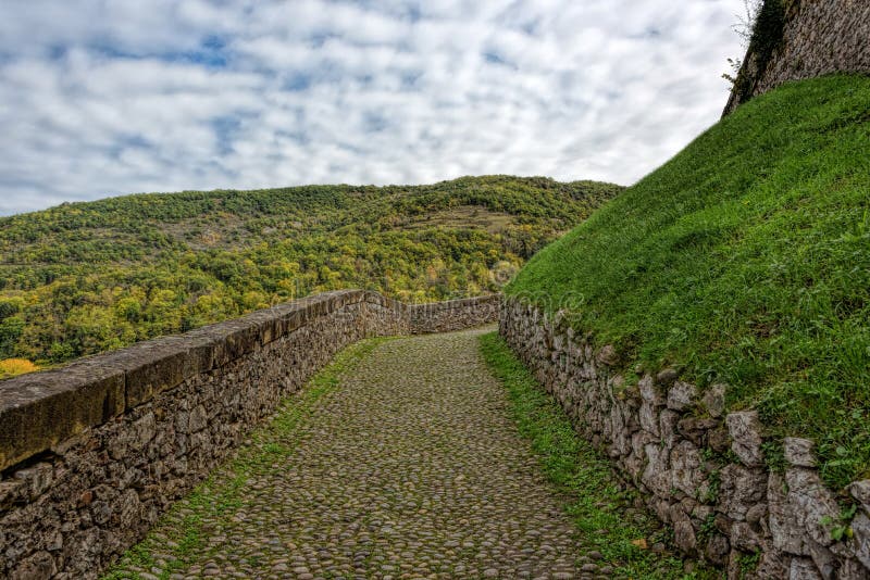 Pathway With Cobblestone With Green Growth Leading Up The Hill Stock Image Image Of Cobblestone Pathway 106618497