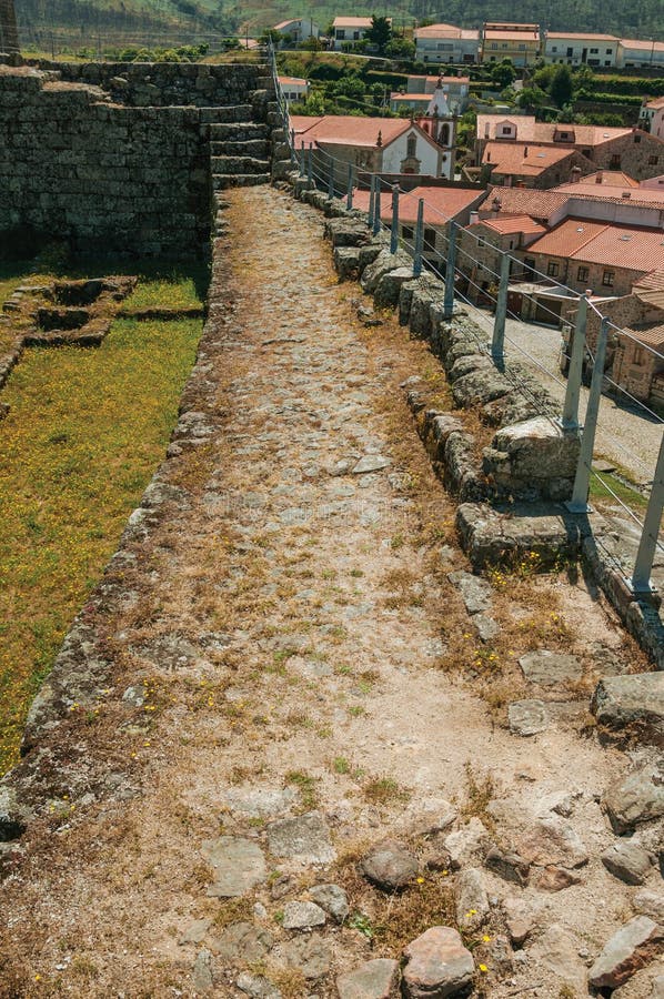 Pathway over stone wall with metal balustrade royalty free stock image Pathway over stone wall with metal balustrade royalty free stock image