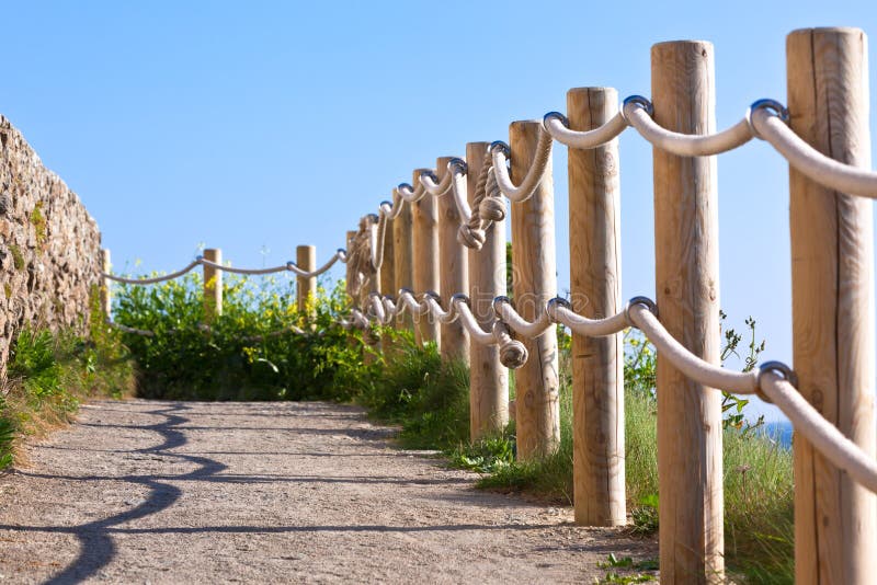 Pathway with wood post fence