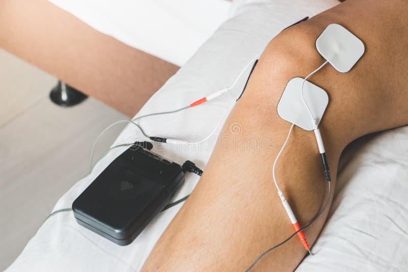 Patient Applying Electrical Stimulation Therapy on Knee Joint. T Stock  Image - Image of pain, equipment: 124785799