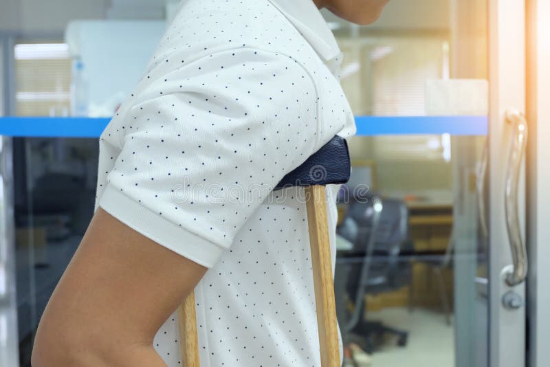 Male Patient Using Crutch In Hospital Stock Photo Image of therapy, wounded 145568674