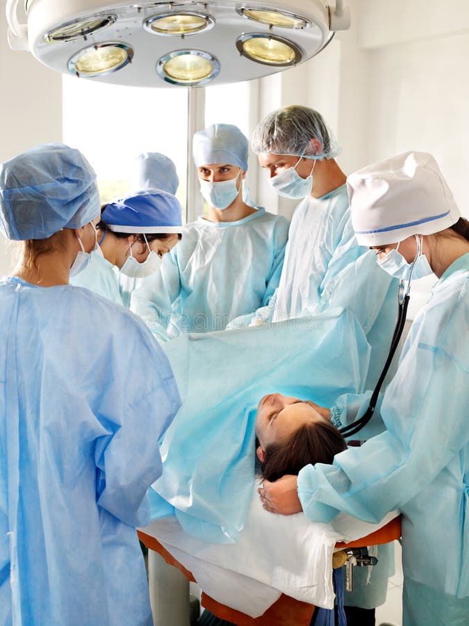 Patient On Gurney In Operating Room. Stock Photos Image 24154243
