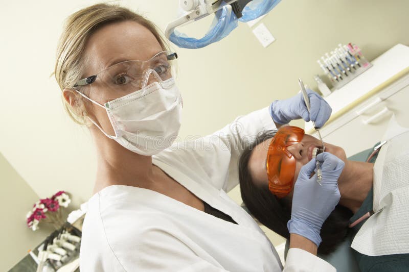 Dental Assistant in Exam Room with Mask on Stock Photo Image of mask