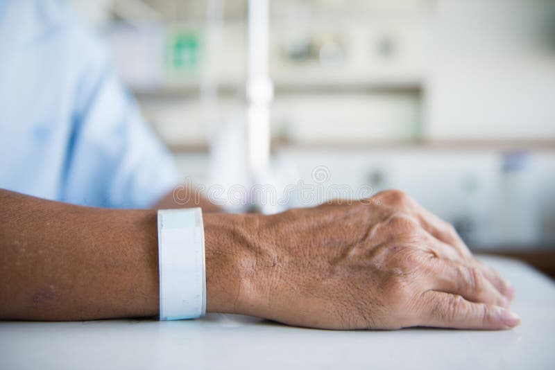 Patient with IV drip and hand tag royalty free stock photo Patient with IV drip and hand tag royalty free stock photo