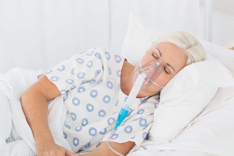 A Patient with an Oxygen Mask Stock Photo Image of reanimation