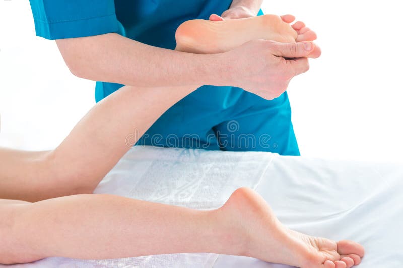 Patient at the physiotherapy doing physical exercises with his therapist royalty free stock photography Patient at the physiotherapy doing physical exercises with his therapist royalty free stock photography