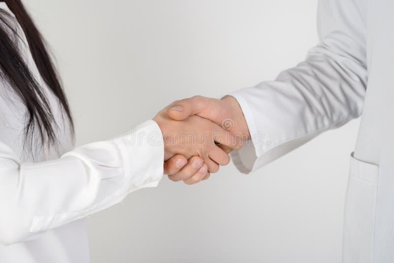 Patient shaking hands with doctor royalty free stock images
