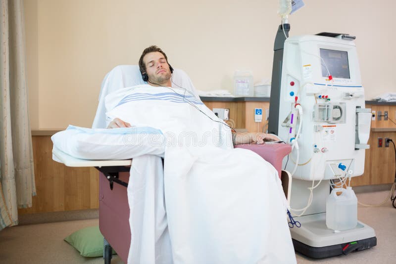 Patient Sleeping While Listening Music at Dialysis