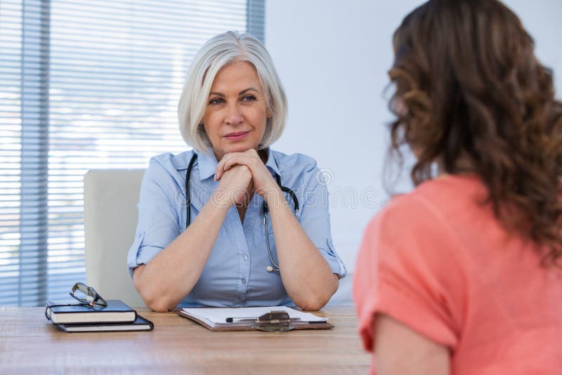 Patient consulting a doctor at the hospital. Patient consulting a doctor at the hospital