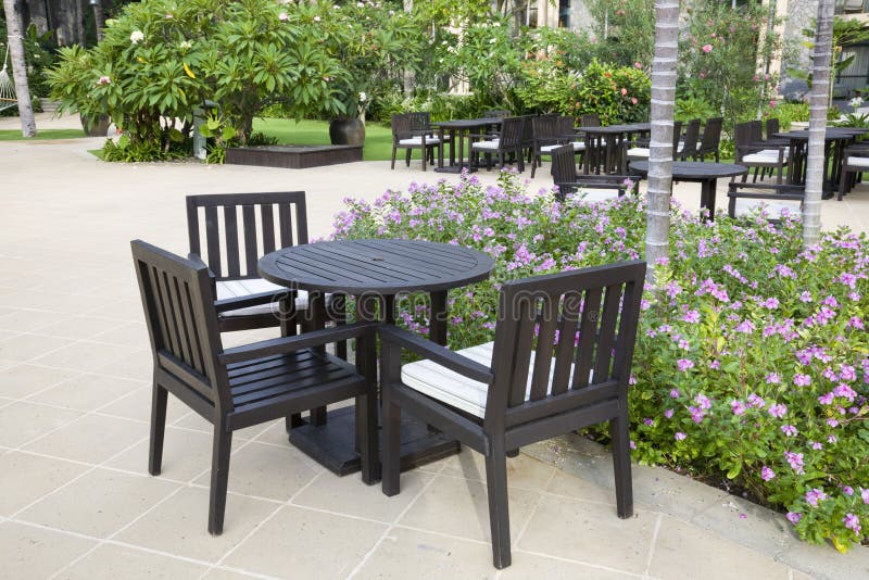 Patio with table and chairs stock photos