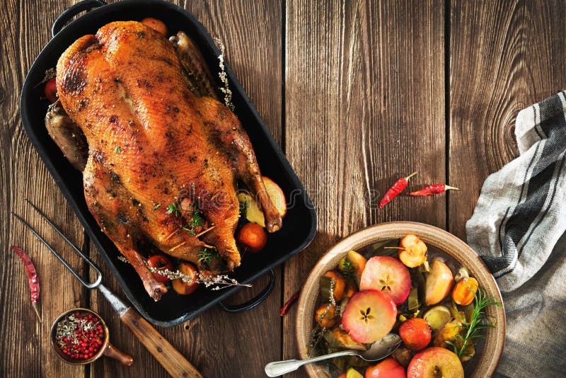 Roast Christmas duck with thyme and apples. Roast Christmas duck with thyme and apples