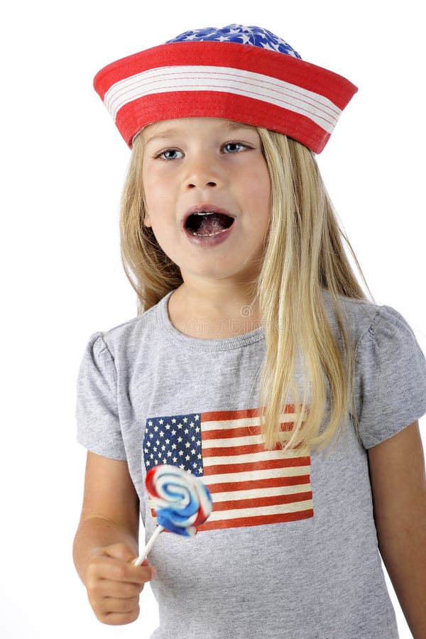 An adorable preschooler in American patriotic clothes. She's paused licking her sucker to sing. (Mouth is blue for the sucker.) On a white background. An adorable preschooler in American patriotic clothes. She's paused licking her sucker to sing. (Mouth is blue for the sucker.) On a white background.