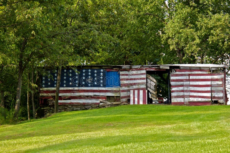 Rickety old shack painted like an American flag. Rickety old shack painted like an American flag.