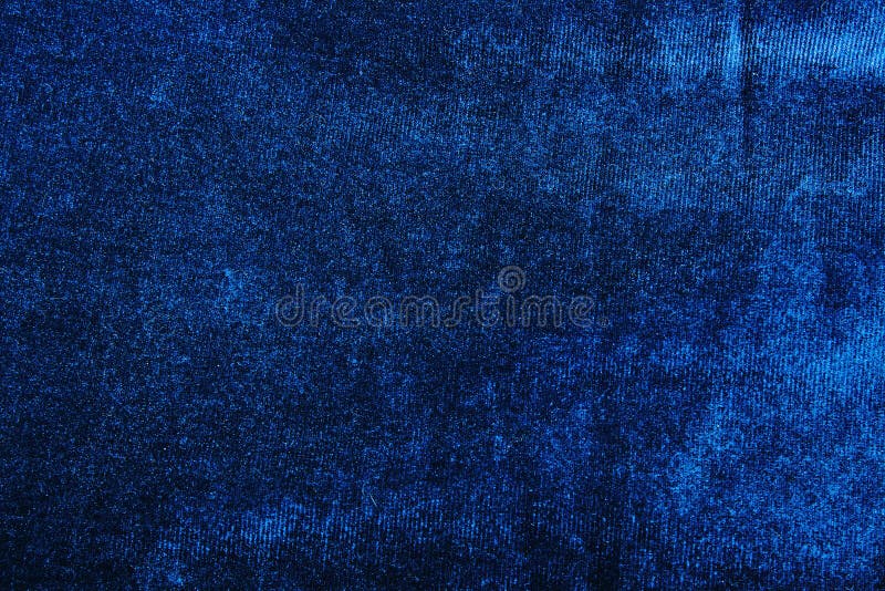 Patroon van de de doektextuur van de fluweelkleding het materiële Blauw fluweel het maken het stikken concept Glanzende mooie man