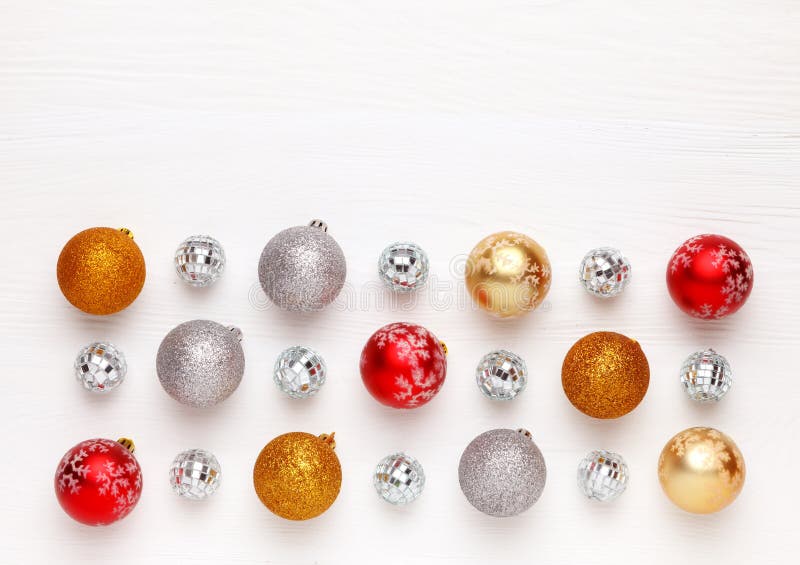 Pattern of Christmas toys colorful balls on white wooden background royalty free stock images Pattern of Christmas toys colorful balls on white wooden background royalty free stock images