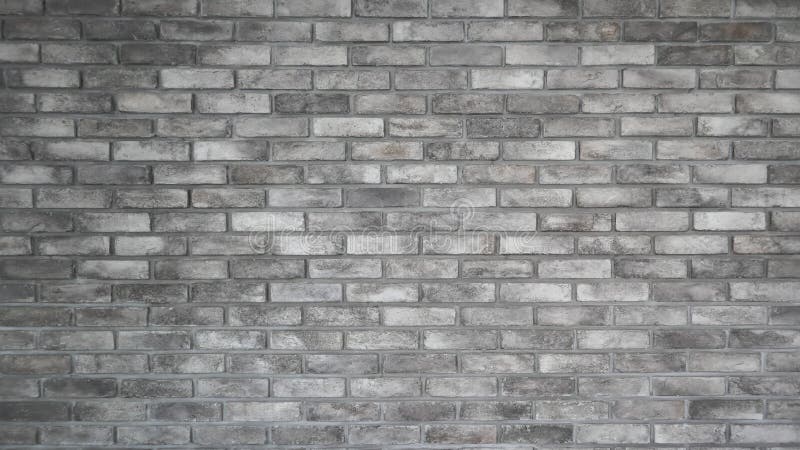 The pattern of old beautiful light gray brick wall and texture