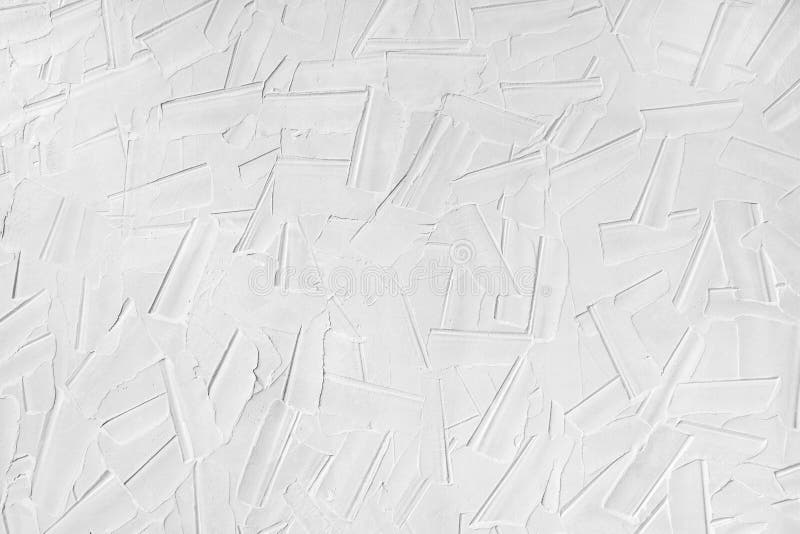 A Pattern on the Plaster Made with a Wide Spatula. White Wall