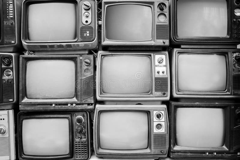 Pattern wall of pile black and white retro television TV - vintage filter effect style.