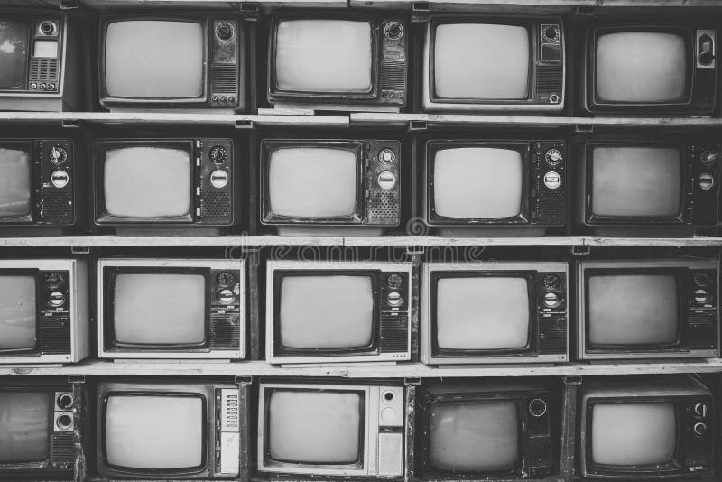 Pattern wall of pile black and white retro television TV - vintage filter effect style.