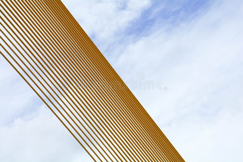 Pattern of yellow wire rope at suspension bridge - abstract background