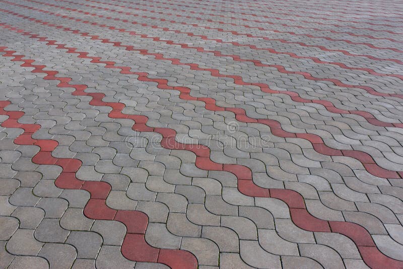 Patterned paving tiles, cement brick floor background