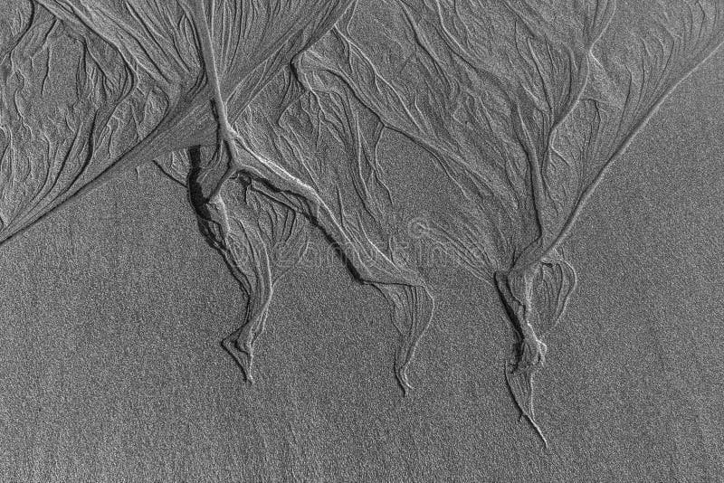 Natural patterns in the sand on an ocean beach. Natural patterns in the sand on an ocean beach.