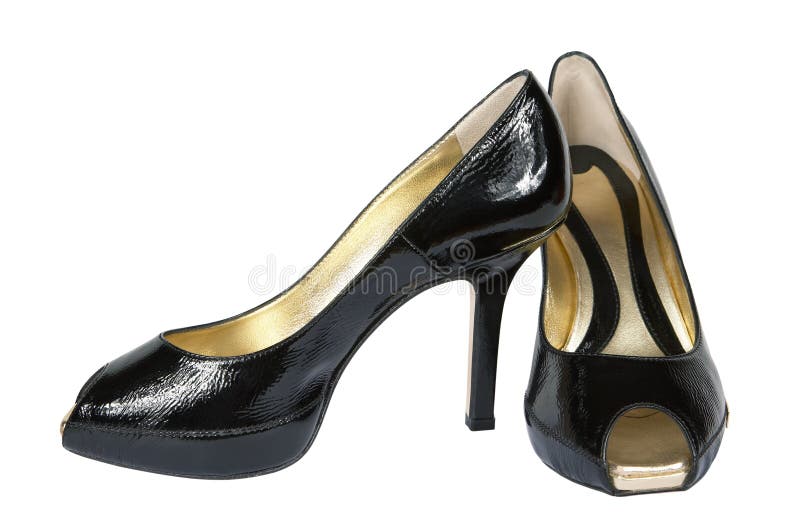 Female shoes from a brilliant leather on a white background. Female shoes from a brilliant leather on a white background