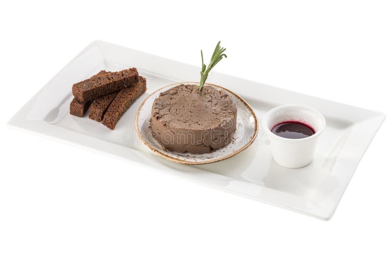 Paté de hígado de pollo con salsa de arándano servido con pan de centeno y con colmenillas aisladas de fondo blanco foto de archivo libre de regalías