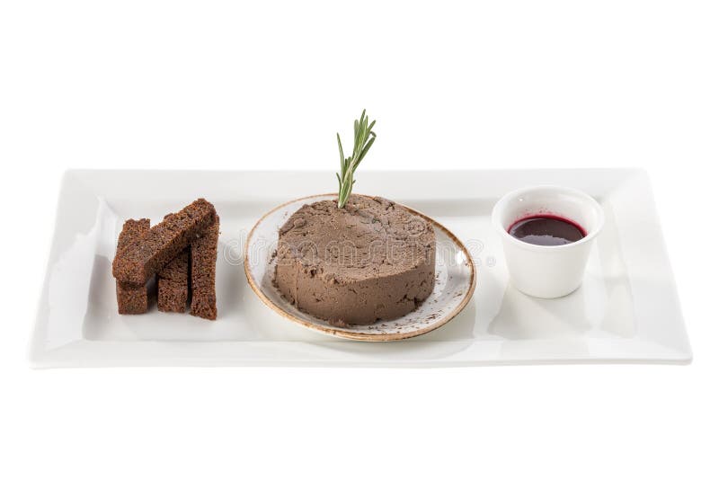 Paté de hígado de pollo con salsa de arándano servido con pan de centeno y con colmenillas aisladas de fondo blanco fotografía de archivo