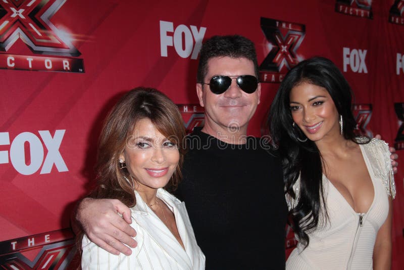 Paula Abdul, Nicole Scherzinger, Simon Cowell foto de archivo