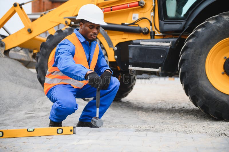 Pavement. Laying paving stones. Cube, openwork plate stock photography