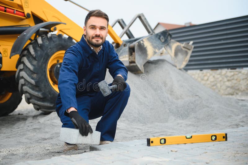 Pavement. Laying paving stones. Cube, openwork plate stock image