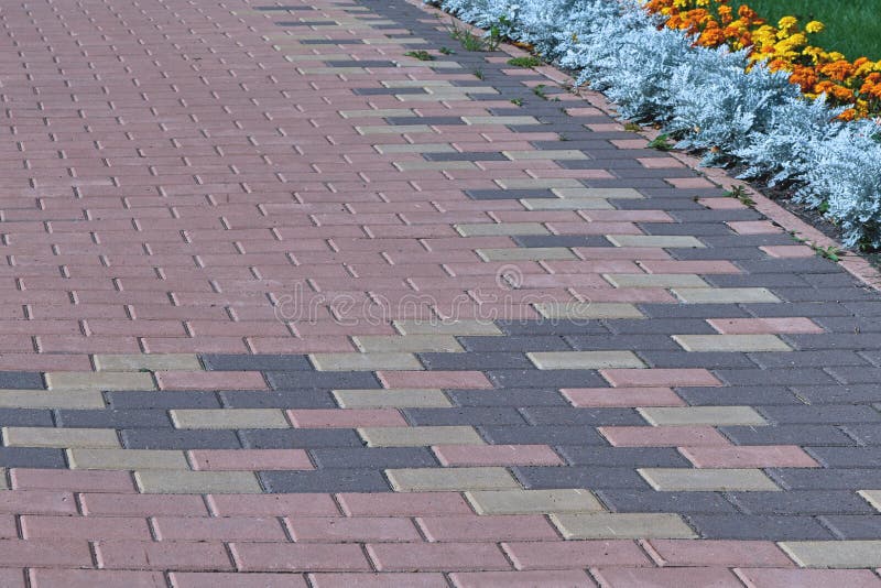 Pavimentación del modelo con forma rectangular y color marrón imagen de archivo libre de regalías Pavimentación del modelo con forma rectangular y color marrón imagen de archivo libre de regalías