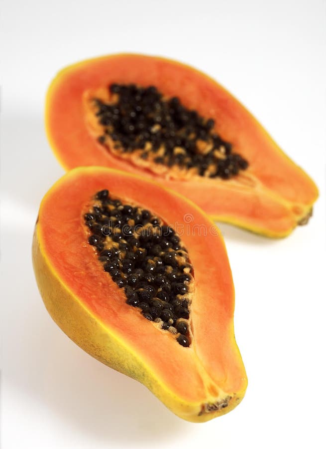 PAW PAW or PAPAYA FRUIT Carica Papaya AGAINST WHITE BACKGROUND Stock