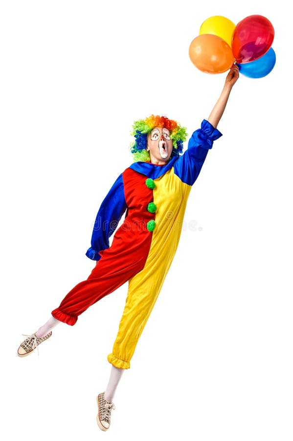 Flying birthday clown with a bunch of balloons. Full body isolated. Flying birthday clown with a bunch of balloons. Full body isolated