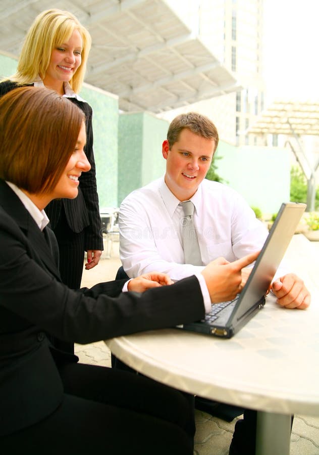 Paying Attention To Business Woman Showing Laptop