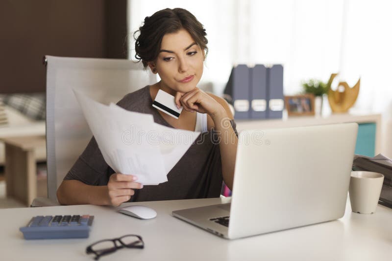 Paying bills by credit card royalty free stock photo Paying bills by credit card royalty free stock photo