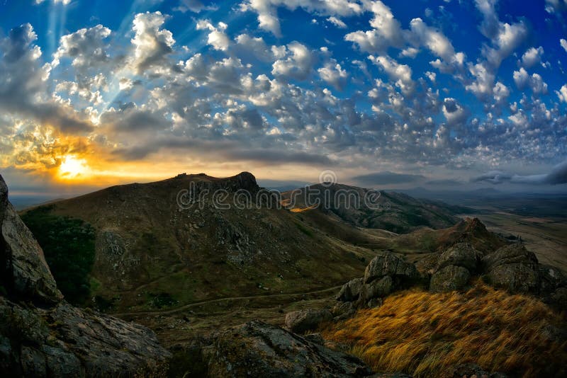 Mountain landscape with beautiful cloudy sky in Dobrogea, Romania. Mountain landscape with beautiful cloudy sky in Dobrogea, Romania