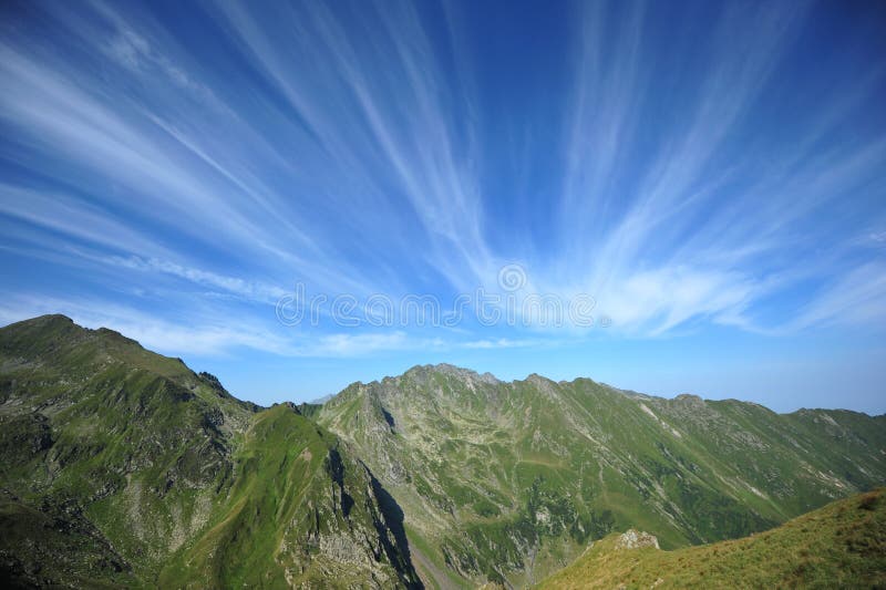 Peaceful green mountains & magnificent summer sky