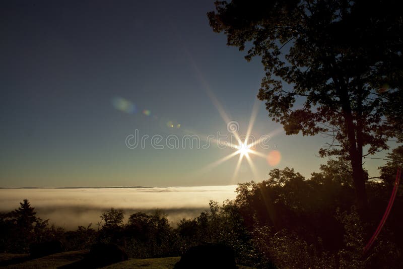 Peaceful landscape with flare. stock photography