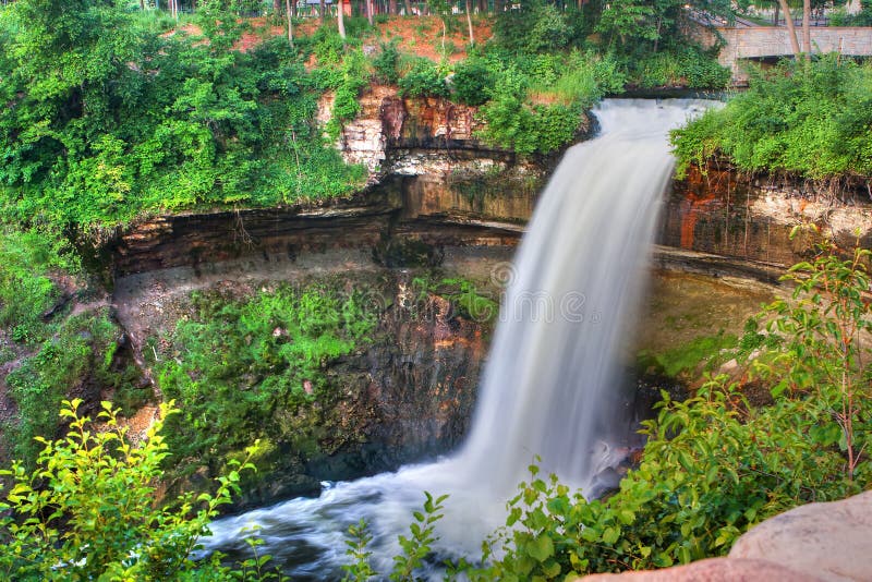 Beautiful waterfall at Minnehaha Falls in Minnesota in High Dynamic Range. Hdr bridge stock images, royalty-free photos and pictures