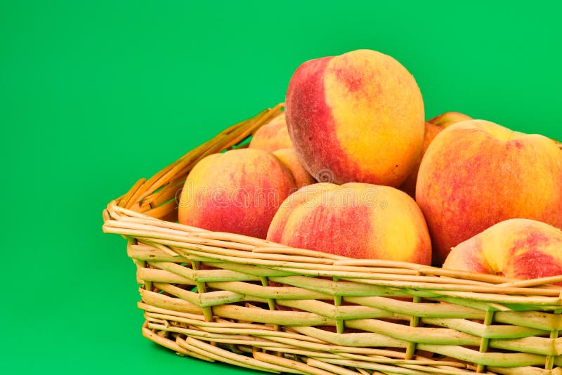 Peach Fruit in Basket on Green Background Stock Photo Image of