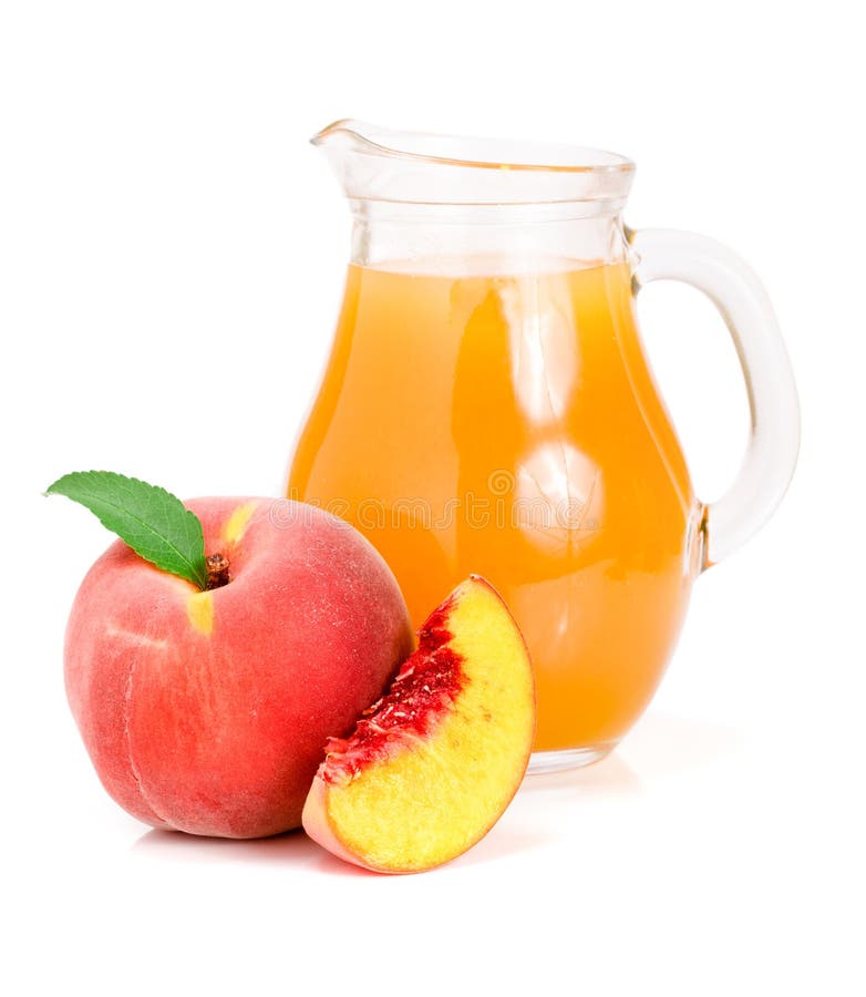 Peach juice in a glass jug isolated on white background stock image Peach juice in a glass jug isolated on white background stock image